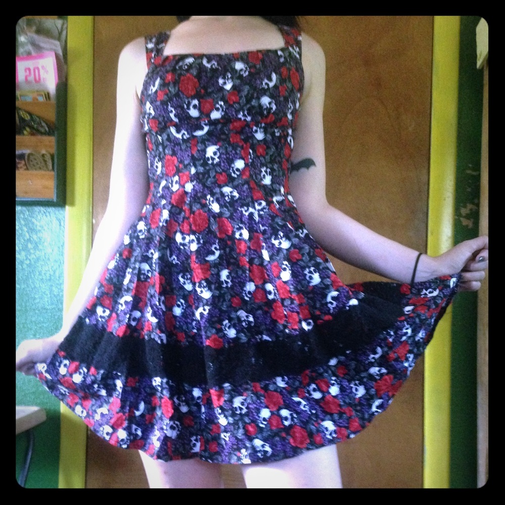 Skulls and flowers on a goth swing dress.